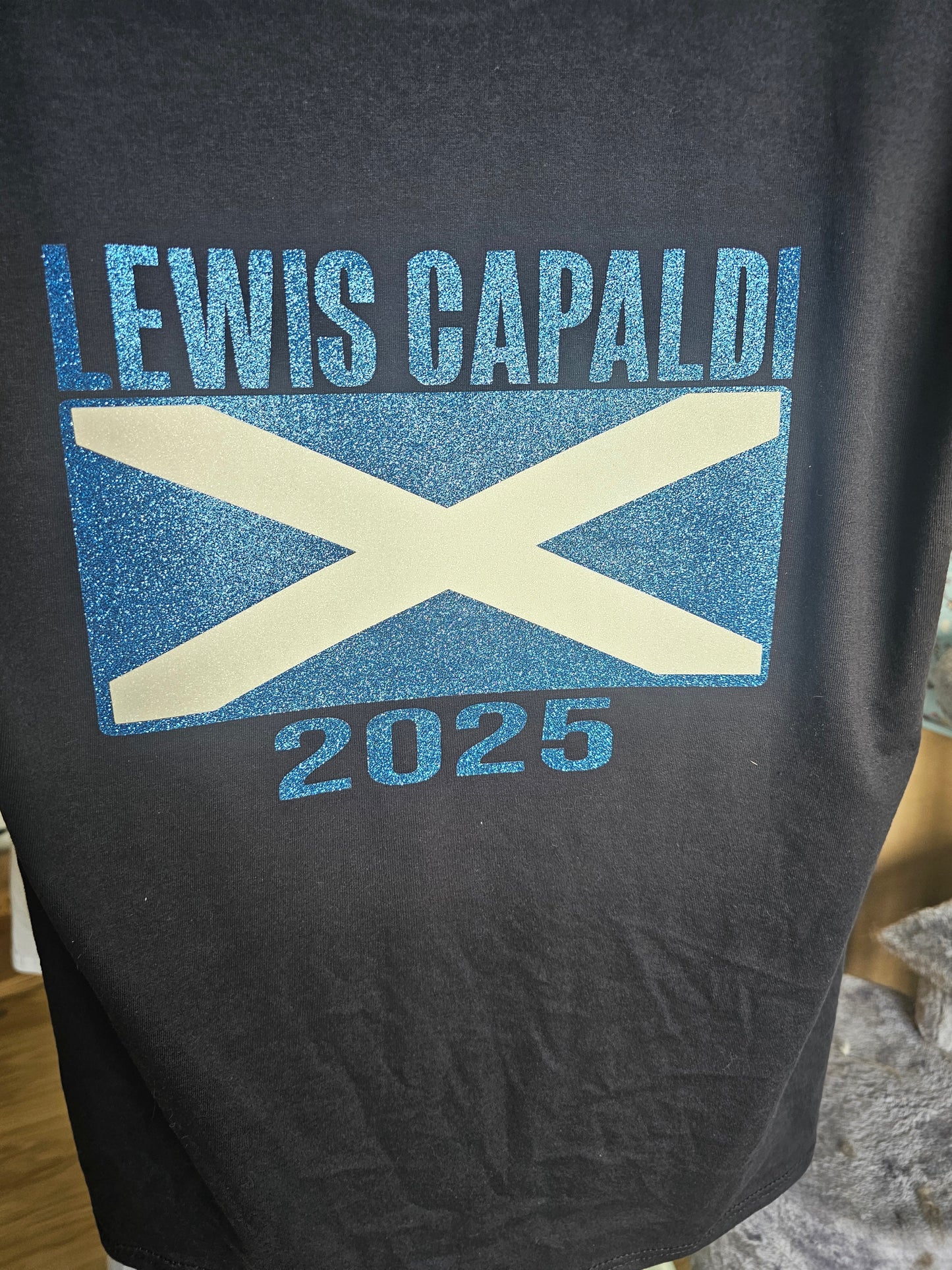 Lewis capaldi concert tshirt with back detail.